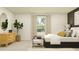 Bedroom with a large window and a sitting area to enjoy the natural light at 1313 Hammock Reserve Dr, Deland, FL 32720
