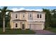 Charming two-story home with a two-car garage, neatly landscaped lawn, and inviting entryway at 2551 Peace Of Mind Ave, Kissimmee, FL 34744