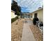 Well-maintained backyard featuring a screened-in lanai, perfect for outdoor enjoyment and entertaining at 2807 Leicester Ter, The Villages, FL 32162