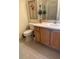 Functional bathroom with a single vanity, neutral finishes, and essential fixtures at 2807 Leicester Ter, The Villages, FL 32162