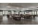 This recreational space has multiple billiard tables, TVs, and seating for relaxing or meeting with friends at 5807 Sw 87Th Ave, Ocala, FL 34481