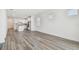 Large living room with plank floors and an open floor plan at 5807 Sw 87Th Ave, Ocala, FL 34481