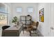 Bright office space featuring modern desk, sleek shelving, and minimalist decor at 5807 Sw 87Th Ave, Ocala, FL 34481