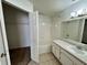 Bathroom with a tub and shower combo, tiled floor and closet at 13103 Mulberry Park Dr # 833, Orlando, FL 32821