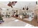 Large clubhouse with a bar, sofas, seating area, pool table, and multiple ceiling fans at 13103 Mulberry Park Dr # 833, Orlando, FL 32821