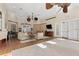 Inviting living room featuring plush sofas, elegant decor, a TV, and stylish flooring for a cozy gathering space at 13103 Mulberry Park Dr # 833, Orlando, FL 32821