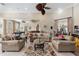 Comfortable lounge area with neutral tones, plush seating, and a billiard table for relaxation and entertainment at 13103 Mulberry Park Dr # 833, Orlando, FL 32821