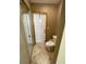 Small bathroom with toilet and mirrored closet at 1275 Man O War Dr, Deland, FL 32724