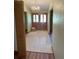 Inviting home foyer with double front doors, closet and tile flooring, leading into the home at 1275 Man O War Dr, Deland, FL 32724