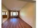 Bright living room with hardwood floors and a bay window that offers plenty of natural light at 1275 Man O War Dr, Deland, FL 32724