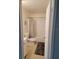 Cozy bathroom featuring a shower with a curtain, toilet, and vanity at 1416 Aguacate Ct, Orlando, FL 32837