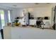 Bright kitchen with stainless steel appliances, modern cabinetry, and an open layout at 1416 Aguacate Ct, Orlando, FL 32837