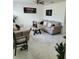 Comfortable living room showcasing neutral tones, marble floors, stylish furniture and modern decor at 1416 Aguacate Ct, Orlando, FL 32837