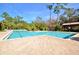 The beautiful outdoor community pool area with crystal clear water for a relaxing day at 1239 Roycroft Ave, Kissimmee, FL 34747
