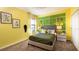 Themed bedroom with tennis decorations and two side tables at 1967 Rider Rain Ln, Apopka, FL 32703