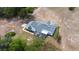 Aerial view of a well maintained single-Gathering home with screened-in lanai at 24025 Ranch Rd, Astatula, FL 34705