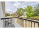 Scenic view from the balcony overlooking lush greenery and part of the backyard at 24025 Ranch Rd, Astatula, FL 34705