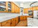 Beautiful kitchen with granite countertops, stainless steel appliances, and ample cabinet space at 24025 Ranch Rd, Astatula, FL 34705
