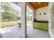 Outdoor kitchen with bar seating and a sink at 24025 Ranch Rd, Astatula, FL 34705