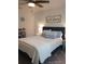 Bright bedroom with ceiling fan, cozy decor, soft lighting, and inviting color scheme at 4616 Grandview Glen Dr, Auburndale, FL 33823