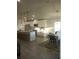 Bright kitchen features stainless appliances, a large island, and an adjacent dining area at 4616 Grandview Glen Dr, Auburndale, FL 33823