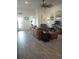 Large open-concept living room featuring modern decor, tile floors, and comfortable furniture at 4616 Grandview Glen Dr, Auburndale, FL 33823