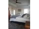 Comfortable main bedroom features a decorative tray ceiling, and lots of natural light at 4616 Grandview Glen Dr, Auburndale, FL 33823