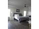 This main bedroom features tray ceiling and large windows that provide abundant natural light at 4616 Grandview Glen Dr, Auburndale, FL 33823