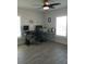 Bright home office with natural light, ceiling fan, and ample workspace for productivity at 4616 Grandview Glen Dr, Auburndale, FL 33823