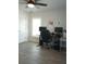 Bright home office with natural light, ceiling fan, and ample workspace for productivity at 4616 Grandview Glen Dr, Auburndale, FL 33823