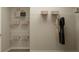 Organized walk-in closet with wire shelving for storage, including baskets, handbags, and hanging dresses at 7244 Summer Ivy Aly, Orlando, FL 32829