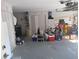 Spacious garage with ample storage space and room for multiple vehicles and storage at 242 Rosa Blanca, Winter Haven, FL 33884
