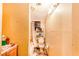 This bathroom is equipped with a tub shower and toilet at 117 Sw 3Rd Ave, Mulberry, FL 33860