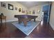 This game room features hardwood floors and a billiards table at 13525 Gorgona Isle Dr, Windermere, FL 34786