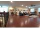 This living room has hardwood floors and a comfortable seating area at 13525 Gorgona Isle Dr, Windermere, FL 34786