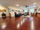 This living room has hardwood floors and a modern seating area at 13525 Gorgona Isle Dr, Windermere, FL 34786