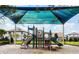 Community playground features slides and climbing structures, perfect for Gathering fun at 13525 Gorgona Isle Dr, Windermere, FL 34786