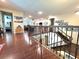 This home has hardwood floors, a staircase with an elegant railing, and lots of open living space at 13525 Gorgona Isle Dr, Windermere, FL 34786
