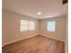 Bedroom features new floors, neutral paint, and natural light at 1505 Piedmont Dr, Deltona, FL 32725