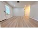 Bright living room with recessed lighting and updated flooring throughout at 1505 Piedmont Dr, Deltona, FL 32725