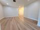 Bright living room with recessed lighting and updated flooring throughout at 1505 Piedmont Dr, Deltona, FL 32725