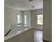 Light and bright upstairs landing with wood-look floors and plenty of natural light at 11578 Ashlin Park Blvd, Windermere, FL 34786