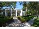 Exterior of the community center with a brick path and landscaping at 11578 Ashlin Park Blvd, Windermere, FL 34786