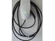 Close-up of a Tesla charger with a coiled cable, mounted on a textured white wall at 11578 Ashlin Park Blvd, Windermere, FL 34786