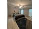 Bedroom featuring a ceiling fan, tile floors, and modern decorations at 118 Jana Cir, Auburndale, FL 33823