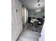 Stylish dining room showcasing a modern table, elegant chairs, and unique lighting at 118 Jana Cir, Auburndale, FL 33823