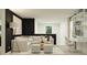 Stylish living room with a sectional, an accent chair, and a dedicated workspace at 1918 Sarah Ln, Winter Haven, FL 33884