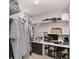 Well-organized closet with shelving, hanging rods, and storage for clothes and shoes at 6873 Sw 131St Pl, Ocala, FL 34473