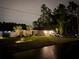 Charming single-story home with a well-manicured lawn, mature trees, and a two-car garage on a well-lit lot at 6873 Sw 131St Pl, Ocala, FL 34473