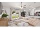 Bright living area featuring modern furnishings, a patio view, and a stylish design at 6873 Sw 131St Pl, Ocala, FL 34473